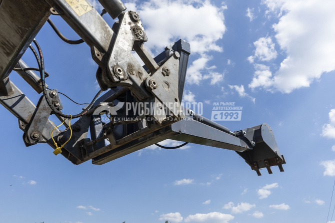 Купить Экскаватор навесной поворотный для трактора в компании Русбизнесавто - изображение 1